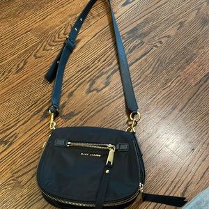 Black material shoulder bag